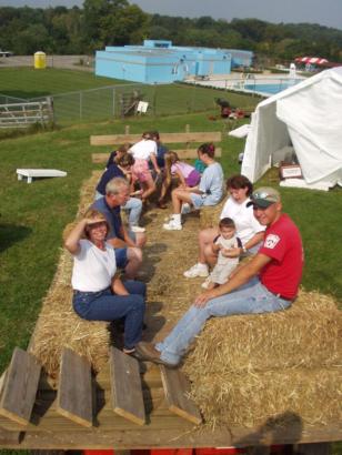Taking the hayride to the petting zoo